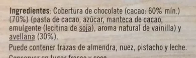 Lista de ingredientes del producto Turrón de chocolate negro y avellanas De nuestra tierra 250 g